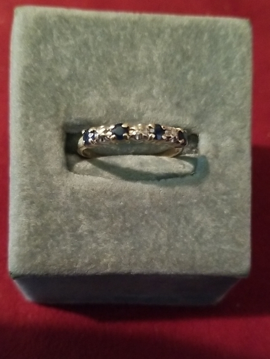 Jewelry - 10K gold band with alternating Sapphires and Diamonds.